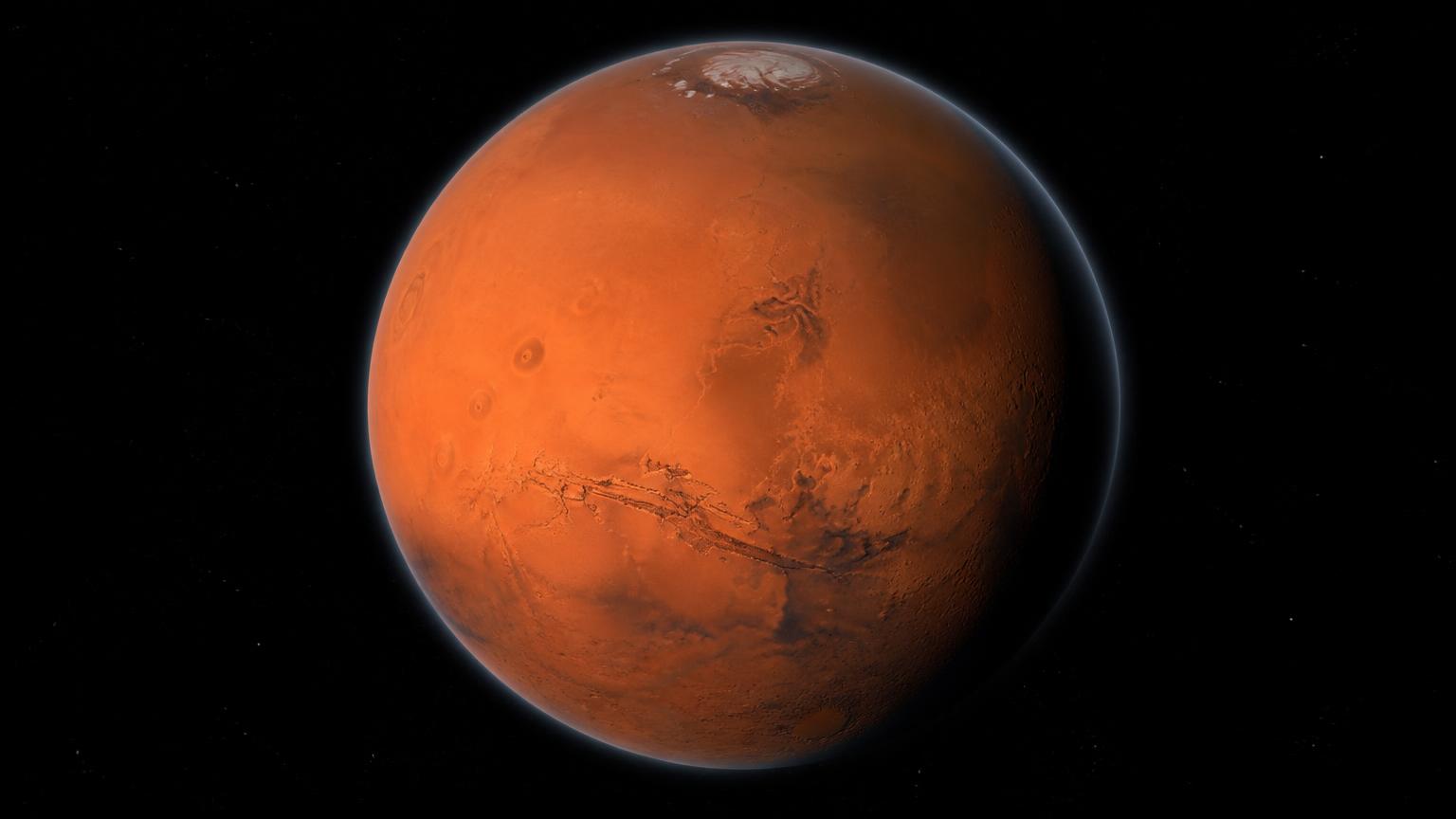 Mars, planète rouge avec sa calotte polaire.